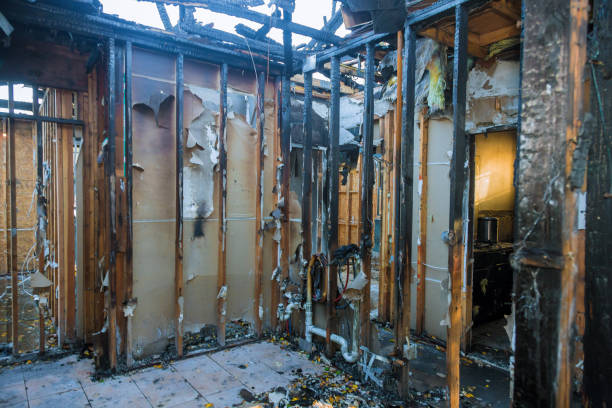 Professional Fire Damage Restoration technician working in Alamogordo, NM